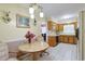 Bright eat-in kitchen featuring tile floors, wood cabinets, and a cozy dining area for casual meals and gatherings at 412 43Rd Ave. N, Myrtle Beach, SC 29577