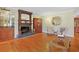 Elegant living room showcasing hardwood floors, a decorative fireplace, and stylish furnishings for comfortable living at 412 43Rd Ave. N, Myrtle Beach, SC 29577