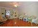 Comfortable living room with hardwood floors and cozy seating arrangements and built in bookshelves at 412 43Rd Ave. N, Myrtle Beach, SC 29577