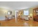 Bright living room with hardwood floors, comfortable seating, and classic decor for relaxation and entertainment at 412 43Rd Ave. N, Myrtle Beach, SC 29577
