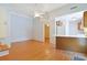 Open floor plan featuring hardwood floors, kitchen, and open doorway to another room at 412 43Rd Ave. N, Myrtle Beach, SC 29577