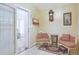 Inviting sitting area with classic furniture, a decorative rug, and a vintage-style clock at 412 43Rd Ave. N, Myrtle Beach, SC 29577