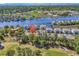 Aerial view of condo community near a river with docks and mature trees at 4430 Eastport Blvd. # L15, Little River, SC 29566