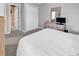 Bedroom featuring a bed with white linens, plus a dresser and closet at 4430 Eastport Blvd. # L15, Little River, SC 29566
