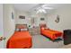 Inviting bedroom with twin beds, a central dresser, and a window, creating a cozy and functional space at 4430 Eastport Blvd. # L15, Little River, SC 29566