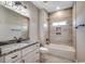 Bathroom with tub and shower combo, marble counters and built-in wall niche at 468 Saint Julian Ln., Myrtle Beach, SC 29579