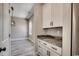 Hallway with cabinets, drawers and marble countertops offer extra storage space at 468 Saint Julian Ln., Myrtle Beach, SC 29579