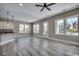 Open-concept living room featuring modern flooring, recessed lighting, and a seamless transition to the kitchen at 468 Saint Julian Ln., Myrtle Beach, SC 29579