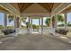 Interior view of a pavilion with swings, columns, and views of the waterway at 468 Saint Julian Ln., Myrtle Beach, SC 29579
