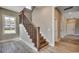 Staircase features wooden steps, white risers and modern metal spindles offer a contemporary feel at 468 Saint Julian Ln., Myrtle Beach, SC 29579