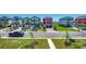 Street view showcasing a row of beautiful, multi-story homes with manicured lawns and private garages at 468 Saint Julian Ln., Myrtle Beach, SC 29579