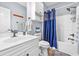 Well-lit bathroom with a shower, a tub, and a vanity with a white countertop at 4787 Wild Iris Dr. # 101, Myrtle Beach, SC 29577