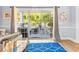 Living room view of a screened patio with comfortable seating, perfect for relaxation and outdoor enjoyment at 4787 Wild Iris Dr. # 101, Myrtle Beach, SC 29577