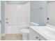 Bathroom featuring white vanity, toilet, and shower-tub combination at 4878 Dahlia Ct. # 104, Myrtle Beach, SC 29577