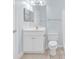 Bathroom featuring a white vanity, tile flooring, and a white shower/tub combo at 4878 Dahlia Ct. # 104, Myrtle Beach, SC 29577