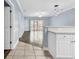 Living room features hardwood floors, ceiling fan, and sliding glass doors to a patio at 4878 Dahlia Ct. # 104, Myrtle Beach, SC 29577
