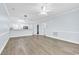 Bright living room featuring open floor plan, light blue walls, and hardwood floors at 4878 Dahlia Ct. # 104, Myrtle Beach, SC 29577