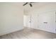Spacious bedroom features modern light wood flooring, white walls, and ample closet space for storage at 4932 South Island Dr., North Myrtle Beach, SC 29582