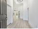 Bright foyer features soaring ceilings, neutral paint, and expansive floors at 4932 South Island Dr., North Myrtle Beach, SC 29582