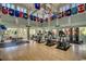 Well-equipped gym with cardio machines, weights, and large windows offering natural light at 4932 South Island Dr., North Myrtle Beach, SC 29582