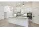 Modern kitchen with a center island, stainless steel appliances, and custom cabinetry at 4932 South Island Dr., North Myrtle Beach, SC 29582