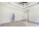Spacious bedroom with ensuite bathroom and doorway to walk-in closet at 4932 South Island Dr., North Myrtle Beach, SC 29582