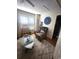 Cozy sitting area featuring a recliner, unique tables, and custom wall decor at 503 20Th Ave. N # 3B, North Myrtle Beach, SC 29582