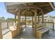 The gazebo offers an inviting space to relax and enjoy scenic views of the water and surrounding landscape at 510 Fairwood Lakes Dr. # 16-I, Myrtle Beach, SC 29588