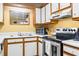 Traditional kitchen featuring a stainless steel range, white cabinets, and a white countertop at 510 Fairwood Lakes Dr. # 16-I, Myrtle Beach, SC 29588