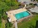 Aerial view of a gated community pool with clear water, lounge chairs, and nearby parking at 510 Fairwood Lakes Dr. # 16-I, Myrtle Beach, SC 29588