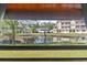 The property offers a tranquil view of the pond and surrounding buildings at 510 Fairwood Lakes Dr. # 16-I, Myrtle Beach, SC 29588
