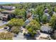 Aerial view of a home surrounded by mature trees in a residential neighborhood at 513 38Th Ave. N # 202, Myrtle Beach, SC 29577