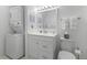 Bathroom with a single sink vanity and a stackable washer and dryer at 513 38Th Ave. N # 202, Myrtle Beach, SC 29577