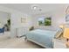 Cozy bedroom with bright window, white furnishings, and a soothing color palette at 513 38Th Ave. N # 202, Myrtle Beach, SC 29577