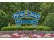 The Myrtle Beach city welcome sign surrounded by colorful flowers and greenery at 513 38Th Ave. N # 202, Myrtle Beach, SC 29577