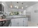 Kitchen with granite countertops, stainless appliances, and convenient breakfast bar with bar stools at 513 38Th Ave. N # 202, Myrtle Beach, SC 29577