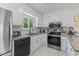 Bright, renovated kitchen with stainless steel appliances and white cabinets at 513 38Th Ave. N # 202, Myrtle Beach, SC 29577