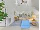 Open concept living space with high ceilings, tile flooring, and view into the kitchen at 513 38Th Ave. N # 202, Myrtle Beach, SC 29577