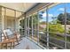 Screened porch with seating, providing a relaxing outdoor space at 513 38Th Ave. N # 202, Myrtle Beach, SC 29577
