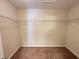 Walk-in closet with ample shelving and neutral carpet at 514 Hay Hill Ln. # C, Myrtle Beach, SC 29579