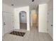 Bright foyer with tile flooring, white walls, and open archways to other rooms at 514 Hay Hill Ln. # C, Myrtle Beach, SC 29579