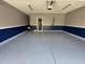 Garage featuring a painted floor, two-tone walls and a Personal door at 514 Hay Hill Ln. # C, Myrtle Beach, SC 29579