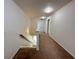 Upstairs hallway with neutral carpet and archway view at 514 Hay Hill Ln. # C, Myrtle Beach, SC 29579