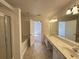 Bright main bathroom with dual sinks, bathtub, and a separate shower at 514 Hay Hill Ln. # C, Myrtle Beach, SC 29579