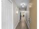 Inviting hallway with neutral walls, wood-look floors, and a view into the living area at 5200 N Ocean Blvd. # 632, Myrtle Beach, SC 29577