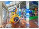 Indoor water park with a submarine structure, slides, and a skylight, creating a fun atmosphere at 5200 N Ocean Blvd. # 632, Myrtle Beach, SC 29577