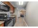 Open kitchen offers wood cabinets, laminate countertops, and standard appliances at 5200 N Ocean Blvd. # 632, Myrtle Beach, SC 29577