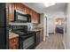 Kitchen with black appliances, including microwave, oven, and dishwasher at 5200 N Ocean Blvd. # 632, Myrtle Beach, SC 29577