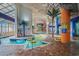 Indoor lazy river with tubes and colorful murals offering a relaxing aquatic experience at 5200 N Ocean Blvd. # 632, Myrtle Beach, SC 29577