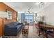 Cozy living room featuring comfortable seating, a ceiling fan, and balcony access with ocean view at 5200 N Ocean Blvd. # 632, Myrtle Beach, SC 29577